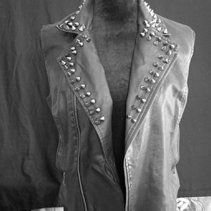 Leather vest with pointy studs